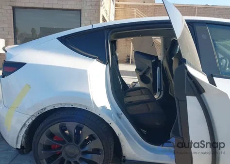 2023 Tesla Model Y Performance Dual Motor All-Wheel Drive z USA, uszkodzony, nr VIN 7SAYGDEF9PF778749